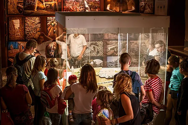 People viewing an exhibit