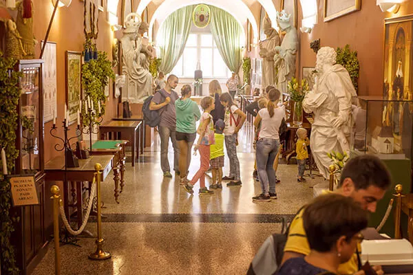 Families walking through museum